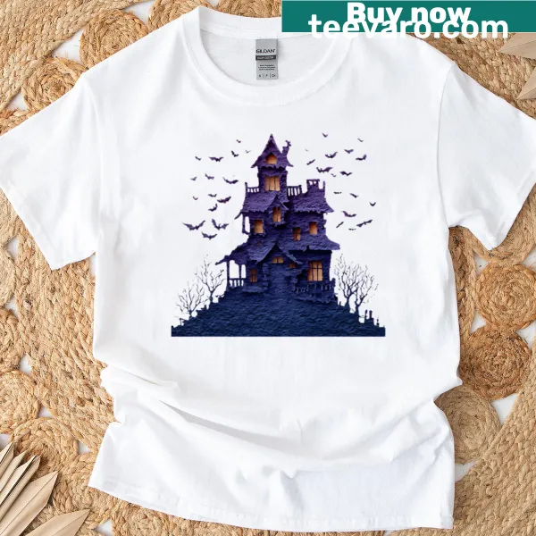 Silhouette of a haunted house with bats on a Halloween T-shirt.
