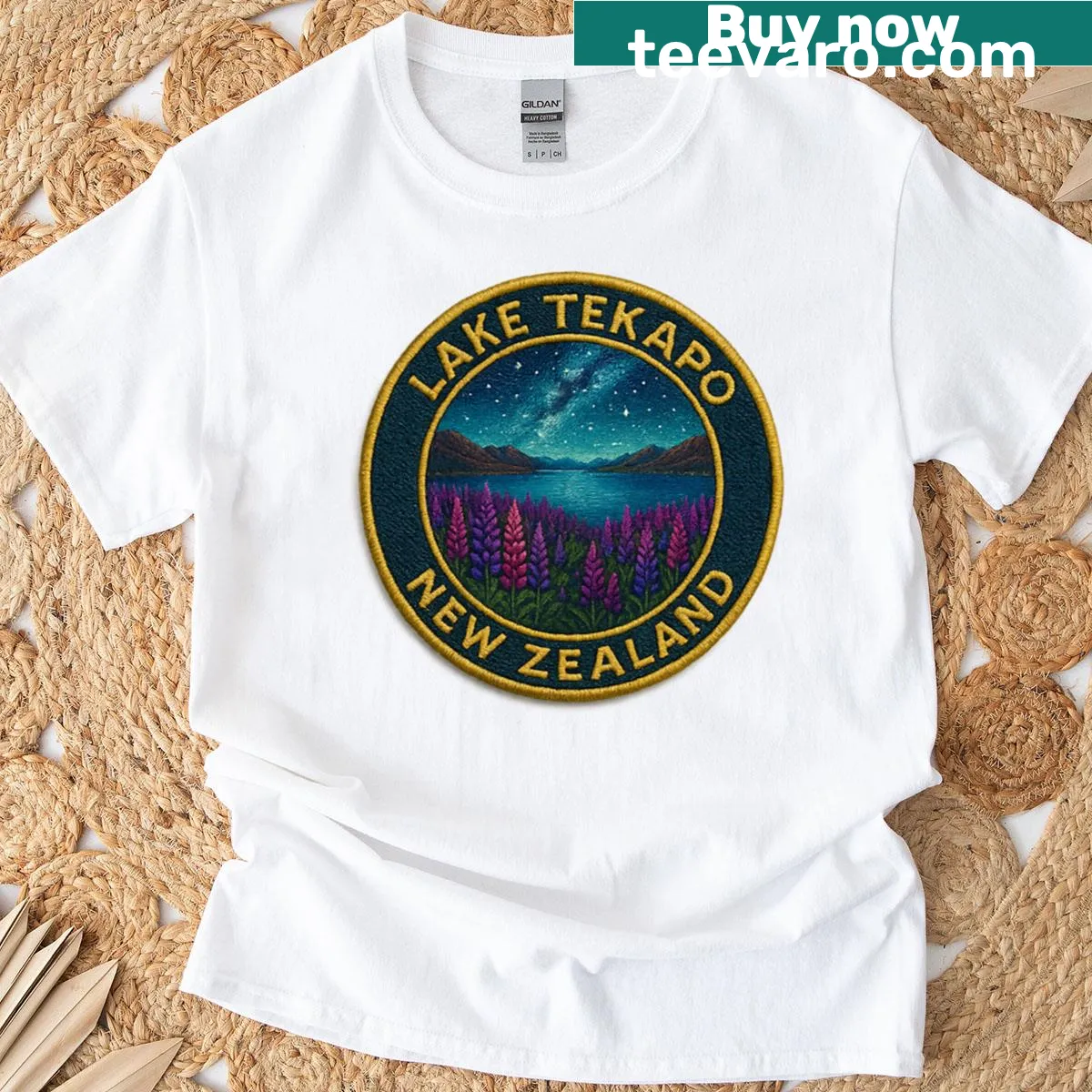 Embroidered T-shirt showcasing Lake Tekapo's beauty, perfect for nature lovers. — on a men's t-shirt