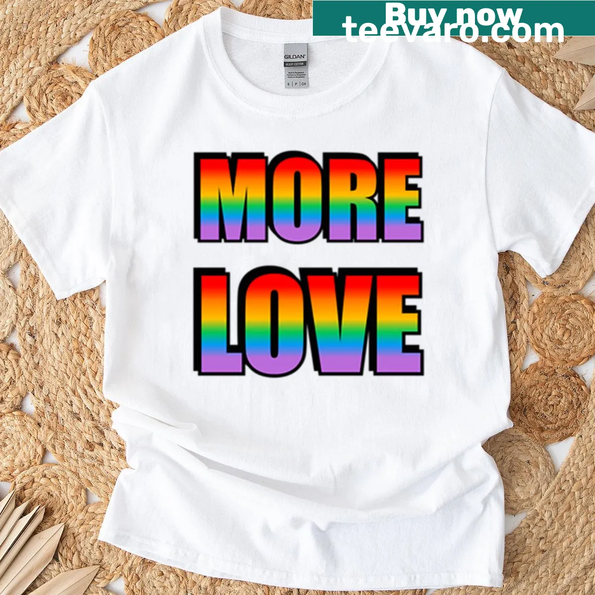 Rainbow text T-shirt with 'More Love' for LGBTQ pride — on a men's t-shirt