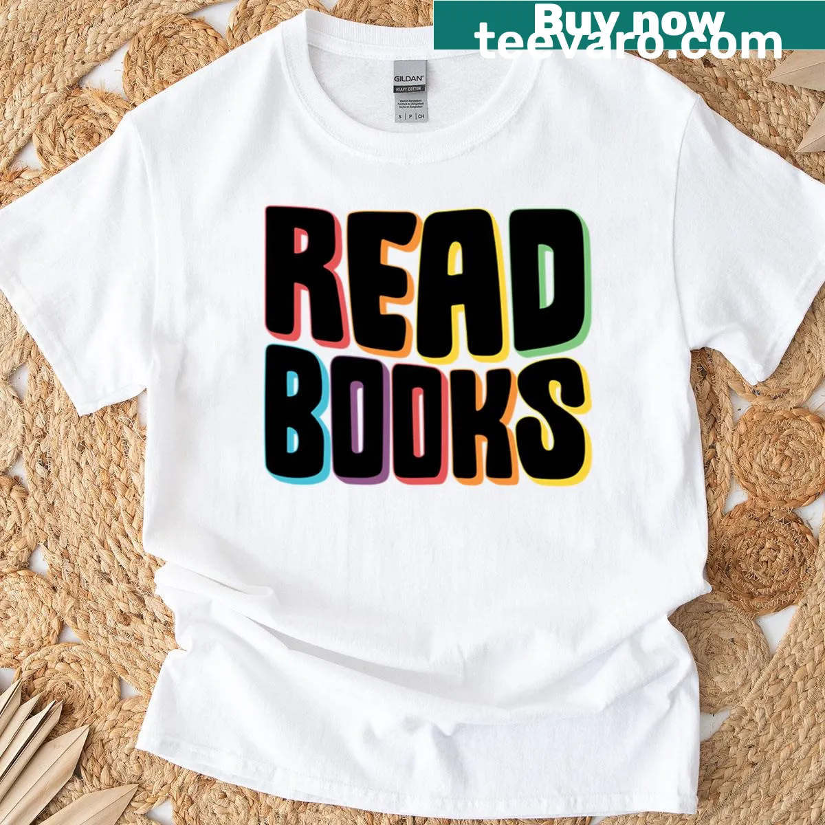 T-shirt featuring the phrase Read Books Pride with a rainbow shadow — on a men's t-shirt