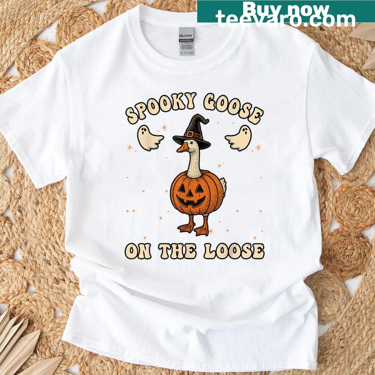 Cartoon goose in a witch hat for Halloween-themed T-shirt — on a men's t-shirt