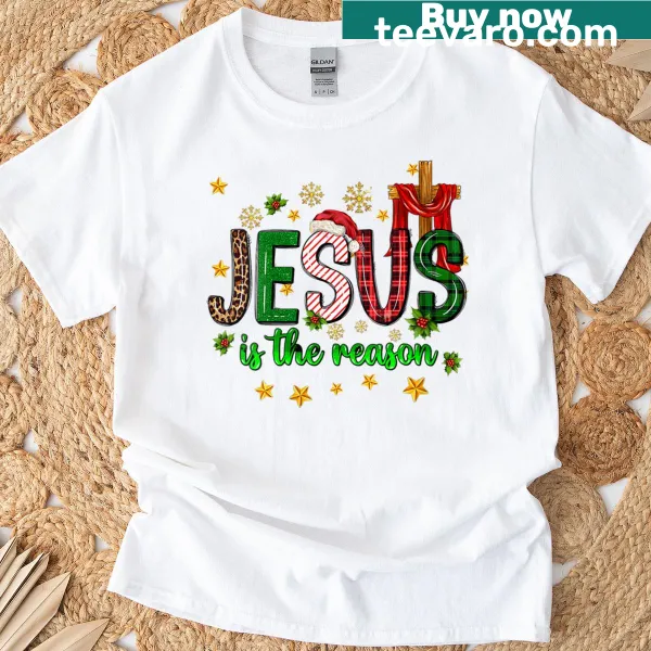 Christmas t-shirt with 'Jesus Is The Reason' text and cross design
