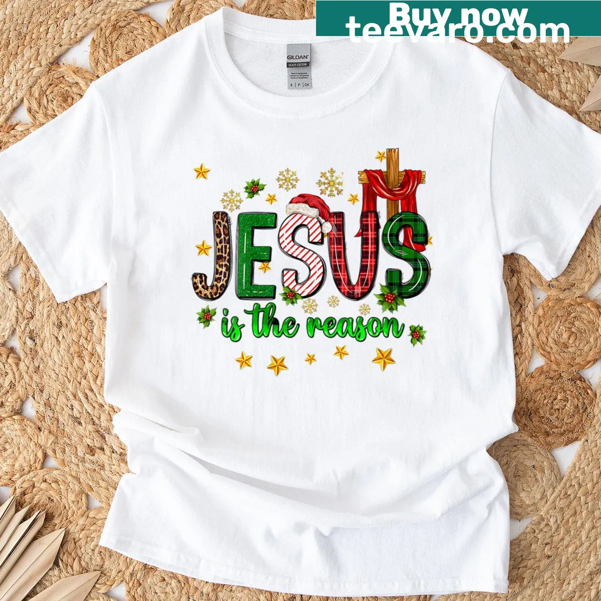Christmas t-shirt with 'Jesus Is The Reason' text and cross design — on a men's t-shirt