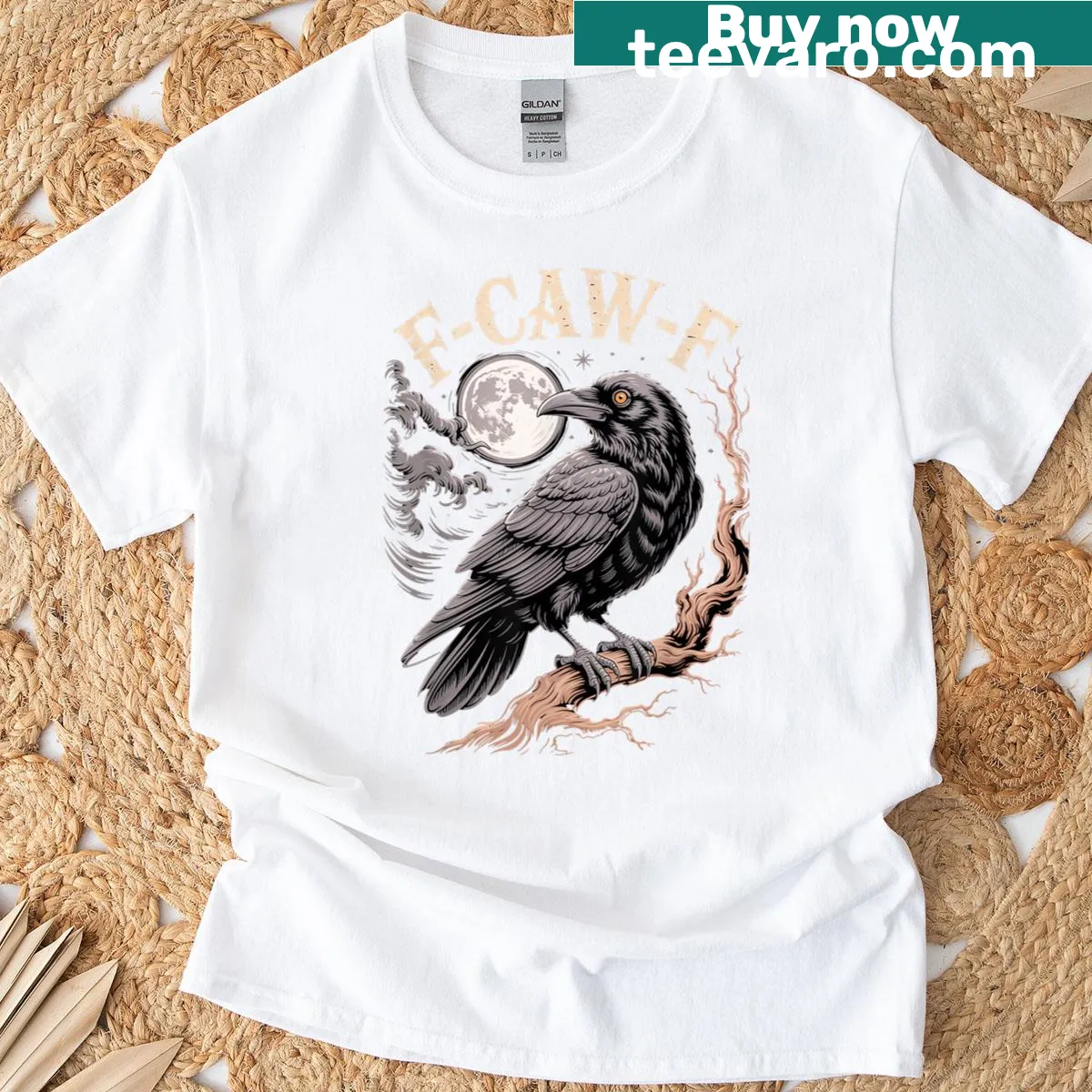 Vintage raven and moon design on a distressed t-shirt — on a men's t-shirt