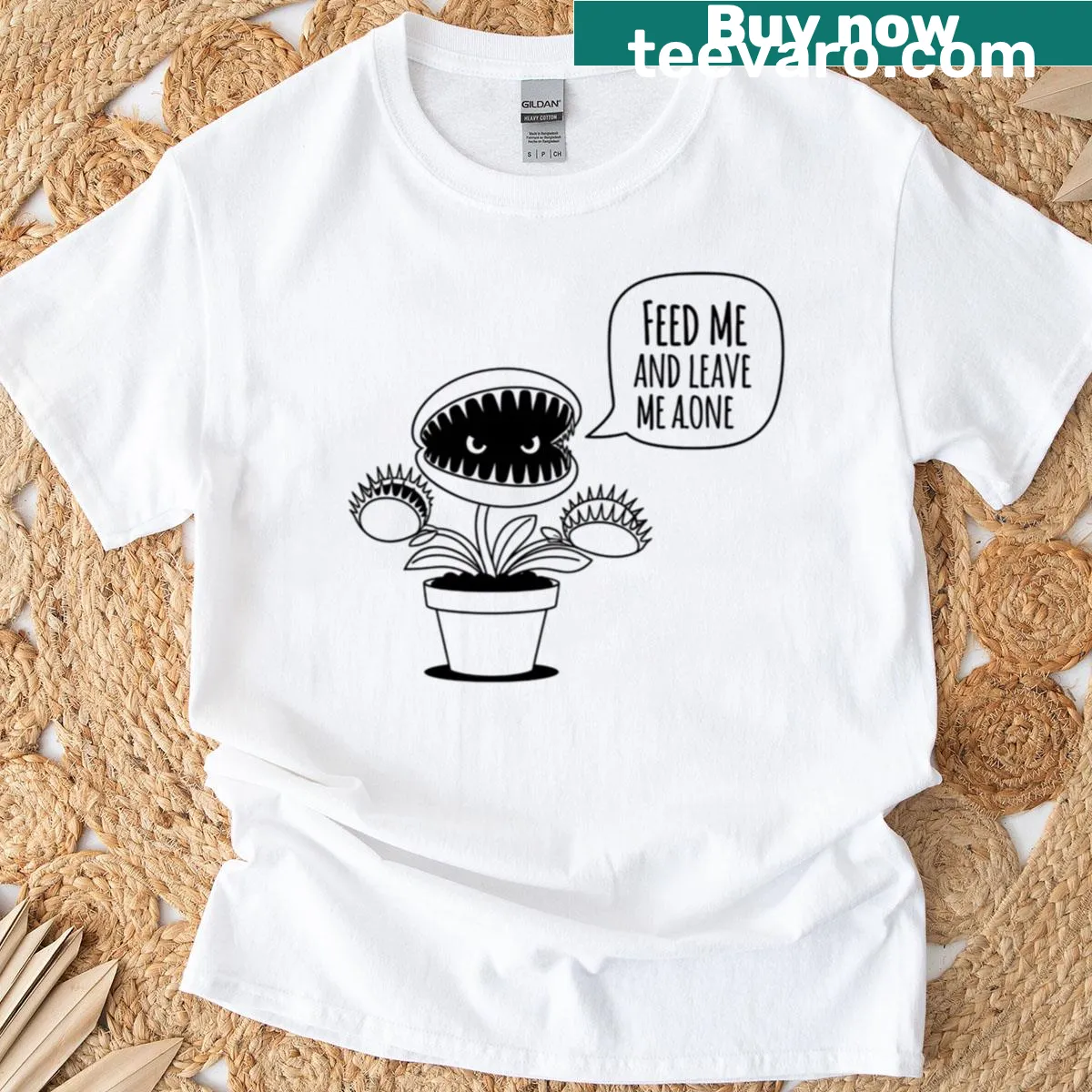 Oversized t-shirt with 'Feed Me And Leave Me Alone' text — on a men's t-shirt