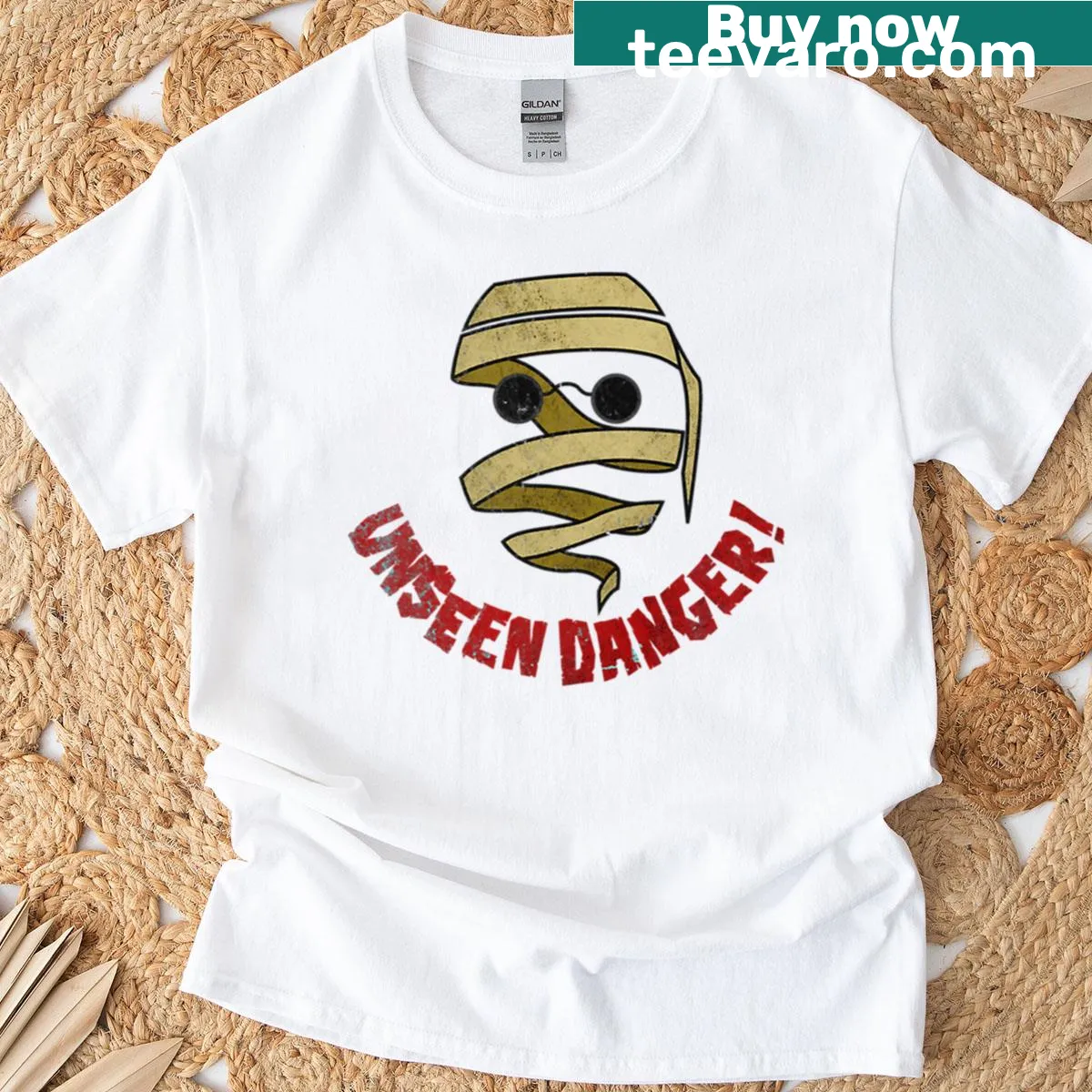 Vintage Invisible Man graphic t-shirt with artistic typography — on a men's t-shirt