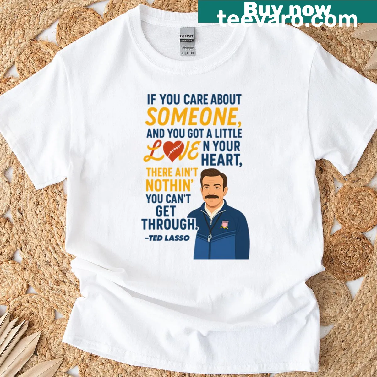 Inspirational T-shirt featuring the quote 'Love in your heart' from Ted Lasso. — on a men's t-shirt