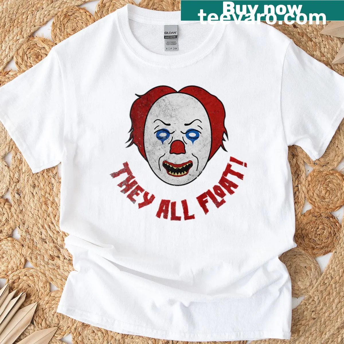 Vintage t-shirt featuring an iconic image of Pennywise the clown — on a men's t-shirt