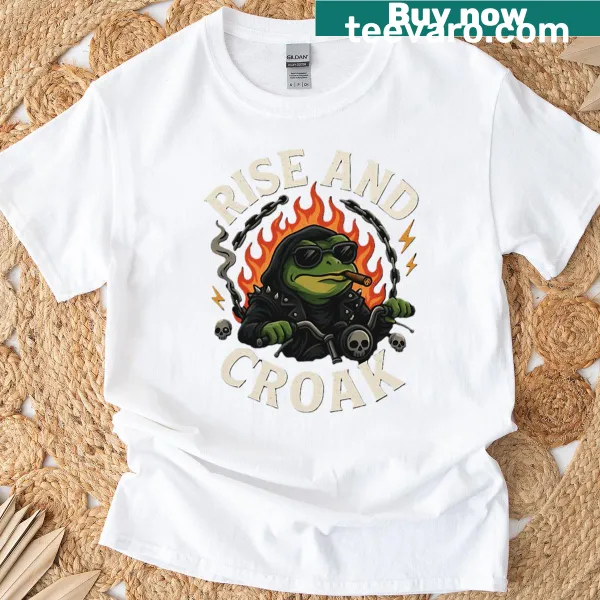 Playful biker frog cartoon t-shirt with 'Rise And Croak' text