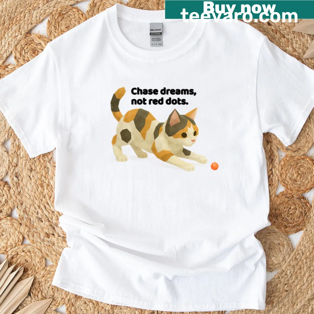 Playful calico cat art chasing red dots on t-shirt — on a men's t-shirt