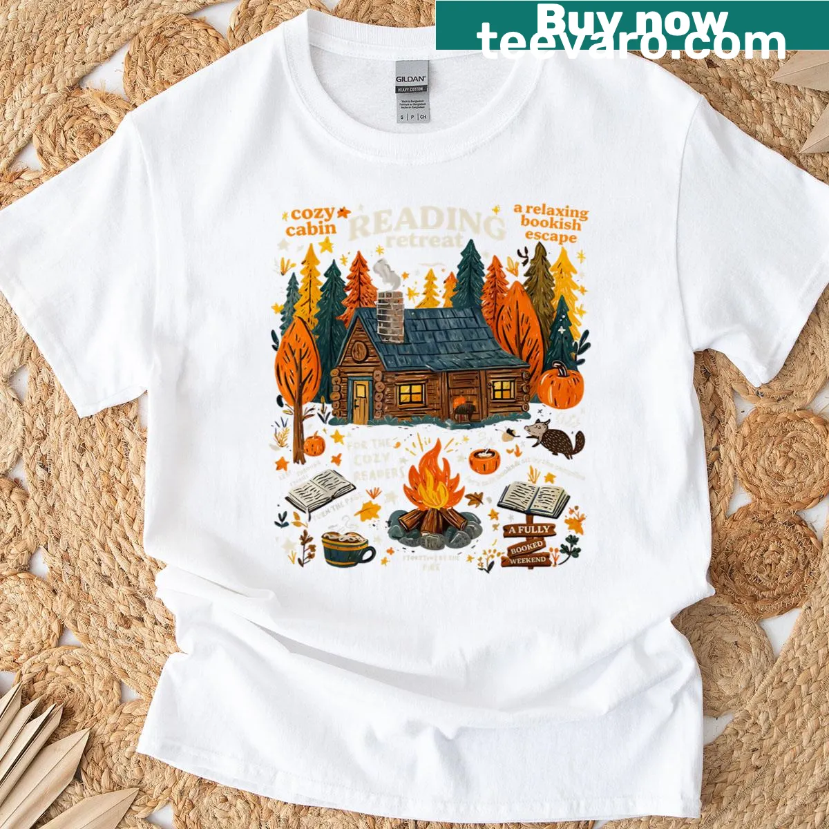 Cozy cabin illustration for book lovers on a fall-themed t-shirt — on a men's t-shirt