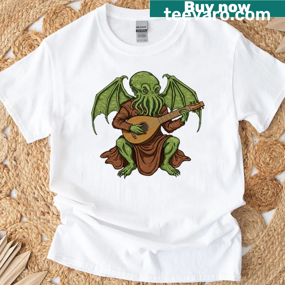 Cthulhu playing lute cartoon design on oversized T-shirt — on a men's t-shirt