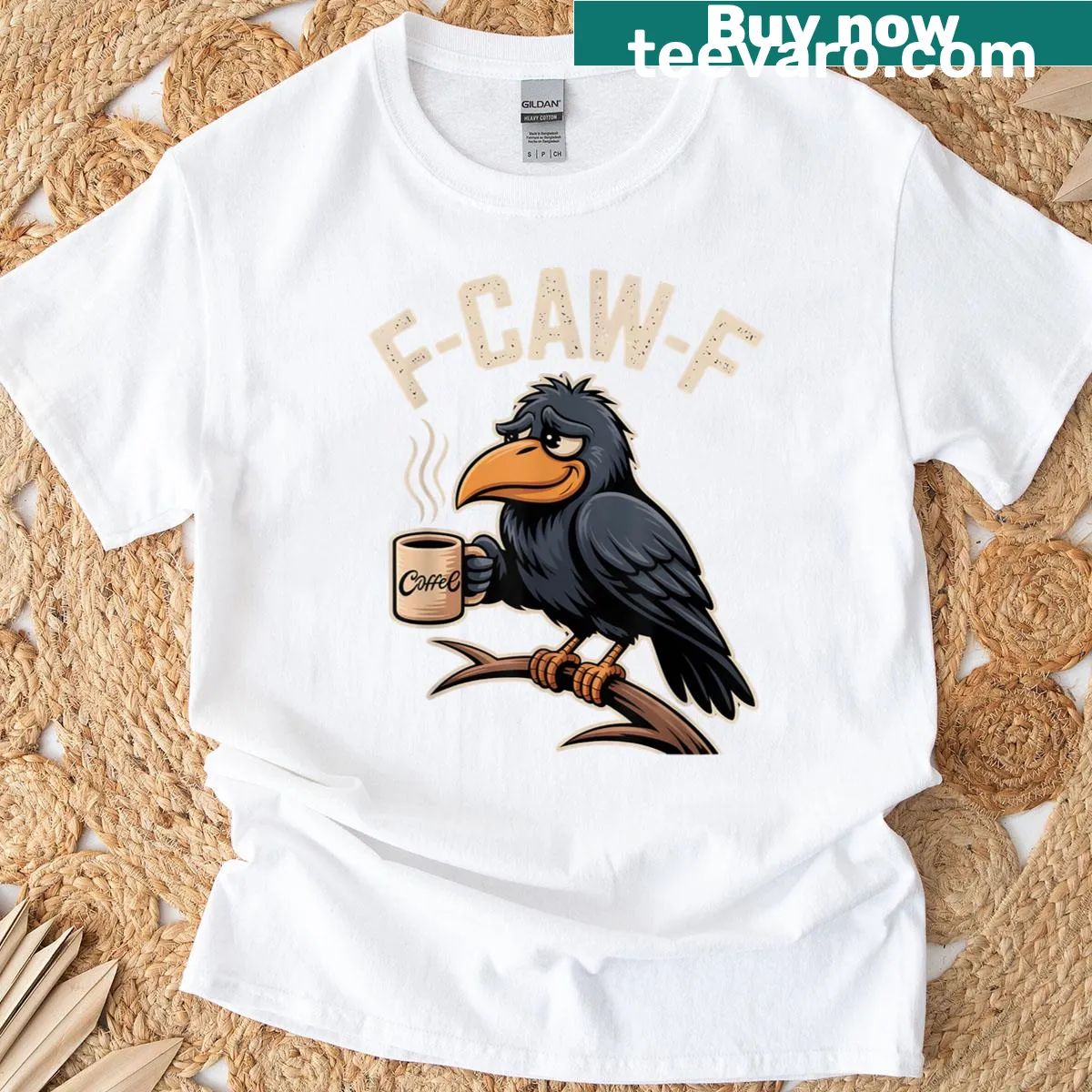 Funny Halloween t-shirt with a crow and text 'F-caw-f Coffee' — on a men's t-shirt
