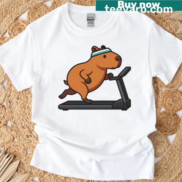 Funny capybara running on treadmill graphic on T-shirt.