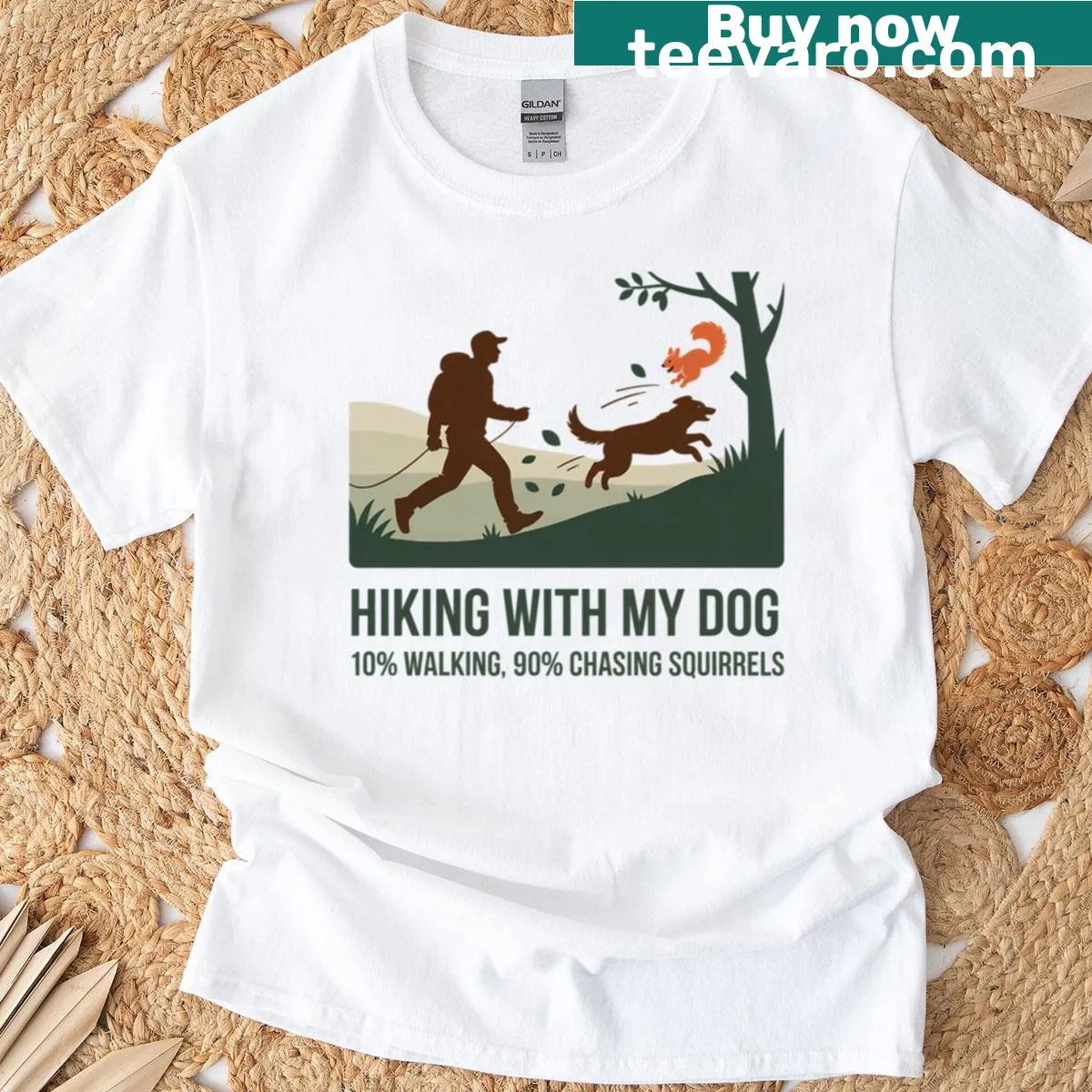 Whimsical hiking t-shirt showing dog chasing squirrels — on a men's t-shirt