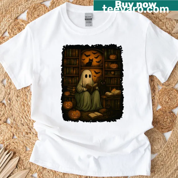 Illustrated T-shirt featuring a ghost reading in a haunted library with cats