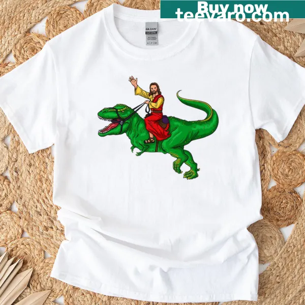 Funny T-shirt featuring a holy man riding a T-rex illustration