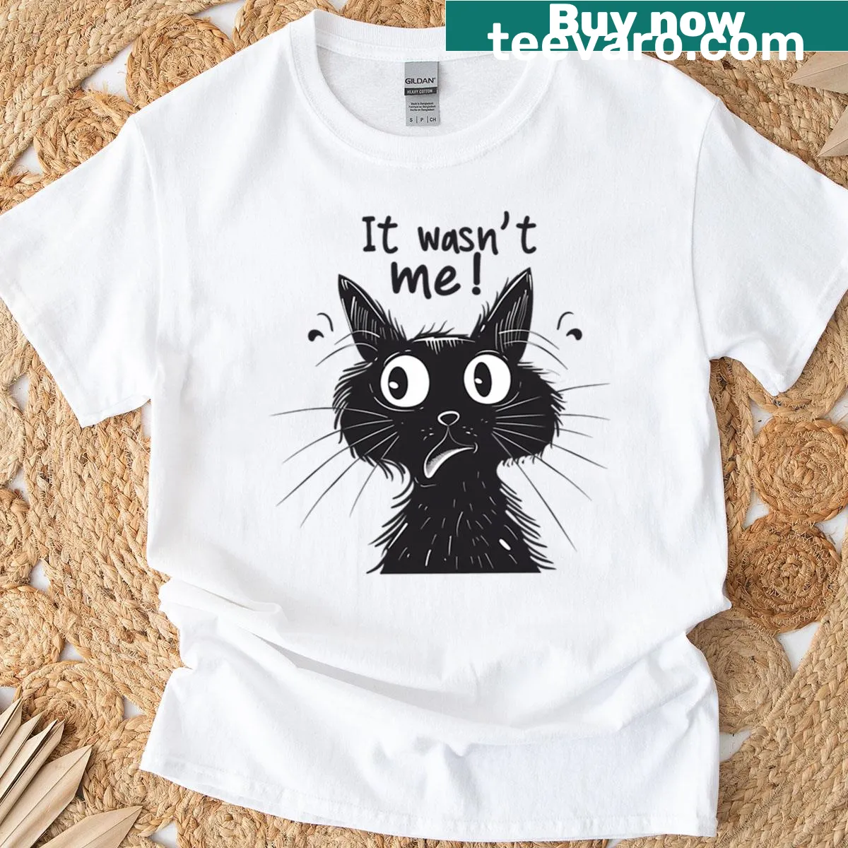 Oversized T-shirt with a funny illustration of a black cat saying 'It Wasn't Me.' — on a men's t-shirt