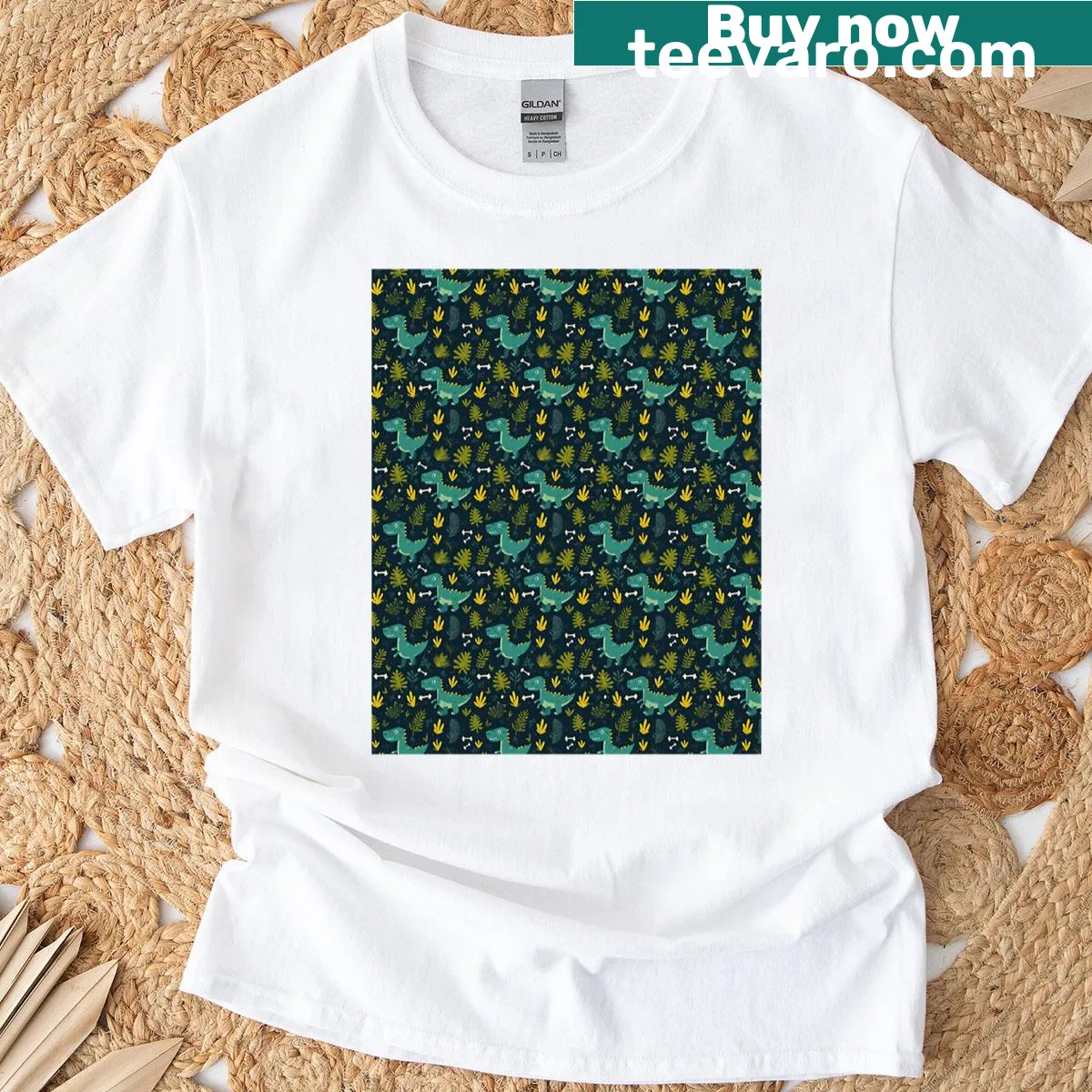 Graphic T-shirt featuring smiling dinosaurs in a jungle setting. — on a men's t-shirt