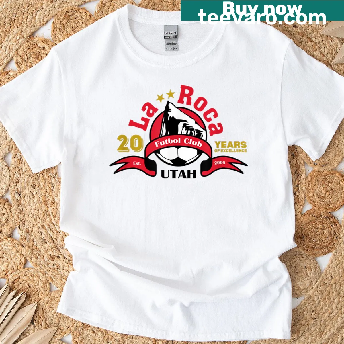 T-shirt featuring the La Roca Soccer Club logo — on a men's t-shirt