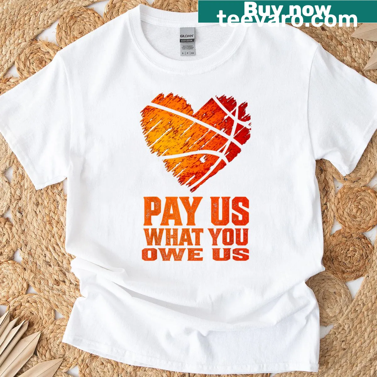 Shirt proclaiming 'Pay Us What You Owe Us' for women's basketball — on a men's t-shirt