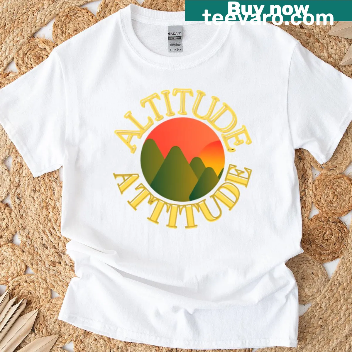 Funny 'Altitude Attitude' quote on oversized mountain-themed t-shirt — on a men's t-shirt