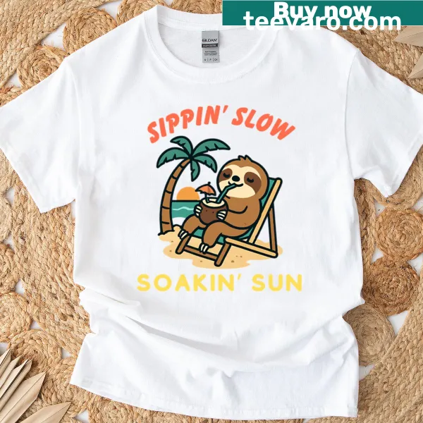 T-shirt with the phrase 'Sippin Slow Soakin Sun' and relaxing imagery