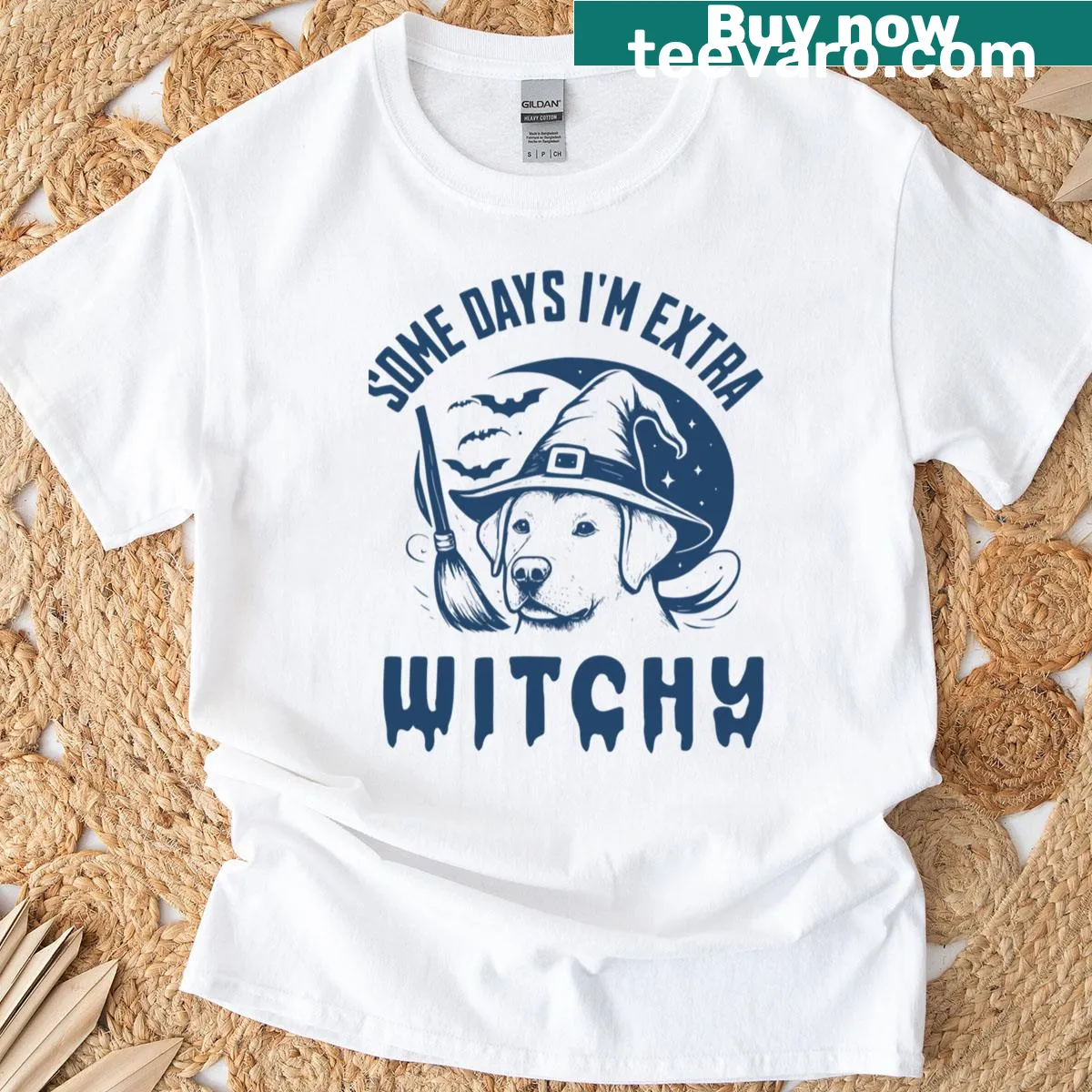 Cartoon Labrador in a witch hat with Halloween details — on a men's t-shirt