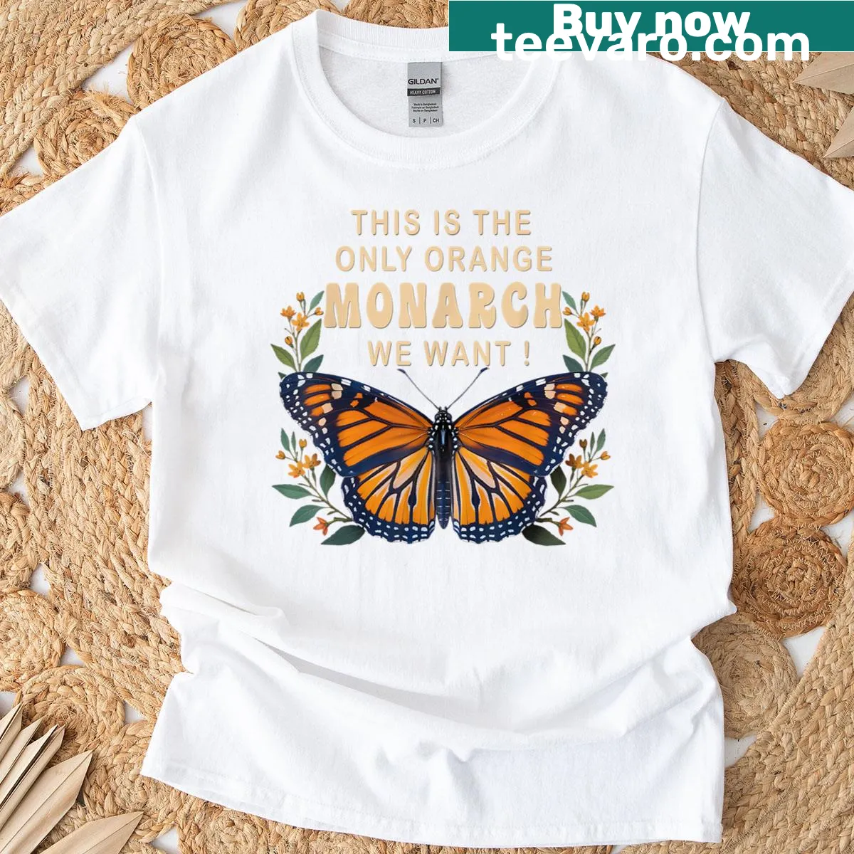 T-shirt with a playful design featuring an orange monarch butterfly and floral elements — on a men's t-shirt