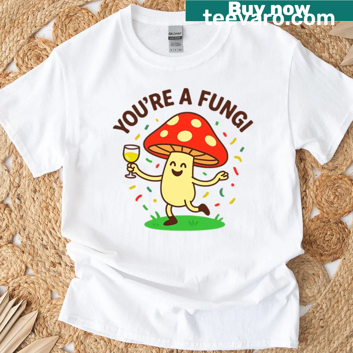 Cartoon graphic of a dancing mushroom with celebratory vibes — on a men's t-shirt