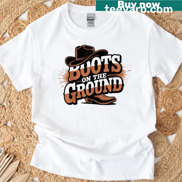 Western cowboy-style t-shirt with boots on the ground design