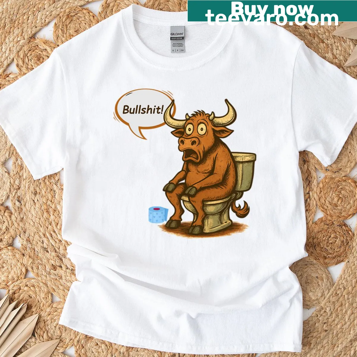 Funny cartoon bull on toilet graphic T-shirt — on a men's t-shirt