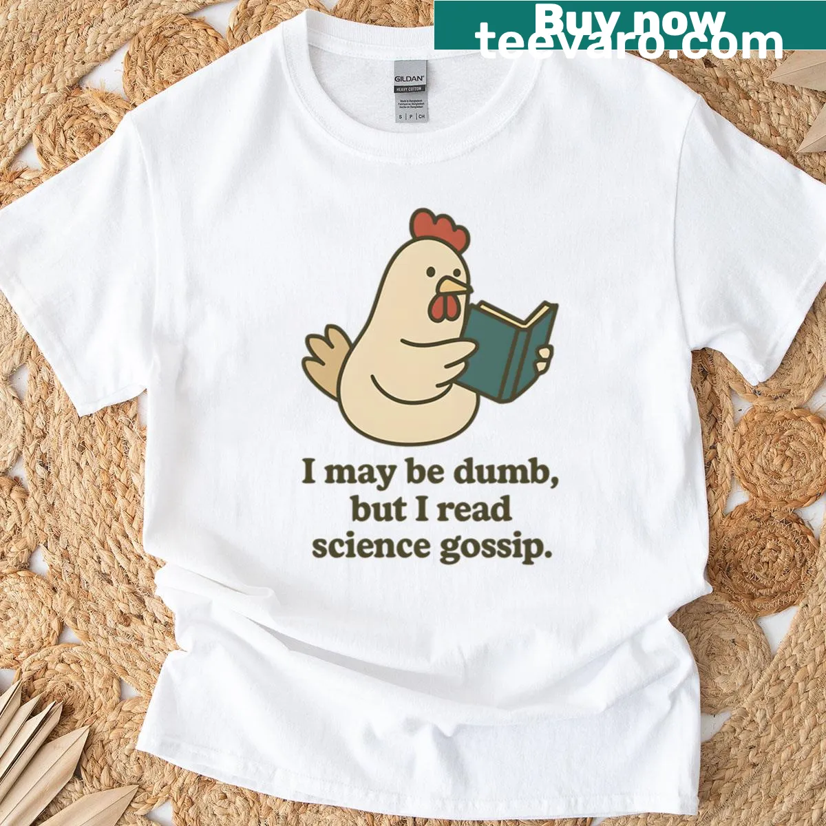 Oversized T-shirt with a chicken reading a book and humorous text — on a men's t-shirt