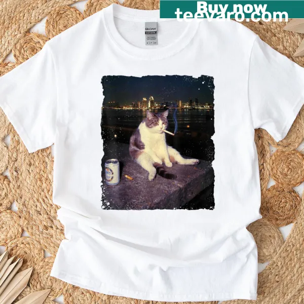 Funny cartoon kitten with a cigarette on a t-shirt