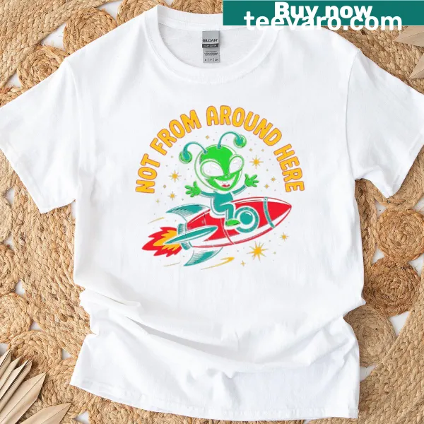 Playful cartoon alien on a rocket graphic on a T-shirt