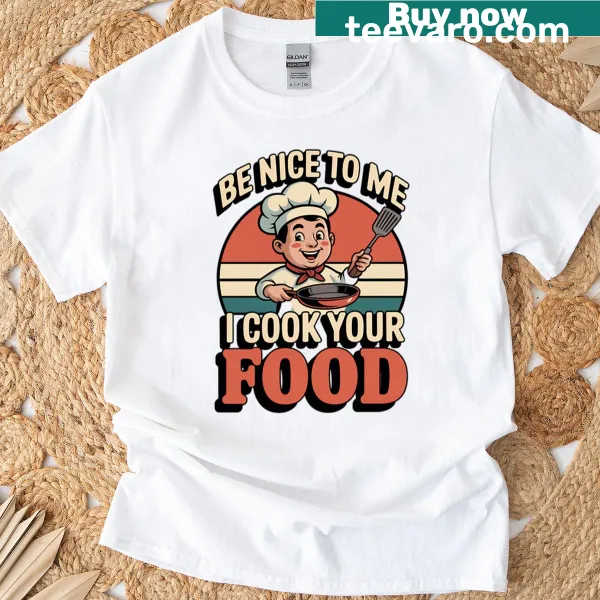 T-shirt with the humorous kitchen quote 'Be Nice To Me, I Cook Your Food'