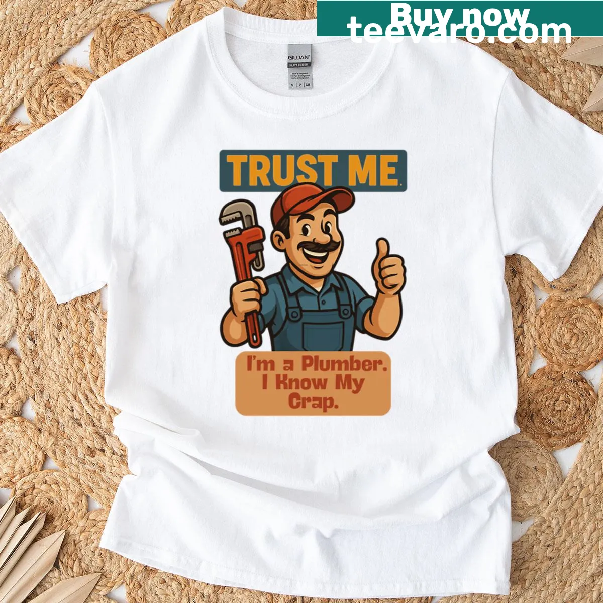 Cartoon plumber t-shirt with the phrase 'Trust Me I Know My Crap'. — on a men's t-shirt