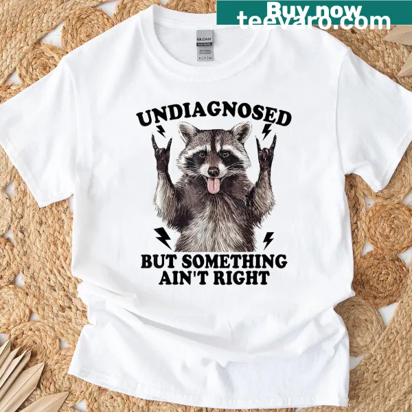 Humorous raccoon graphic T-shirt with funny saying