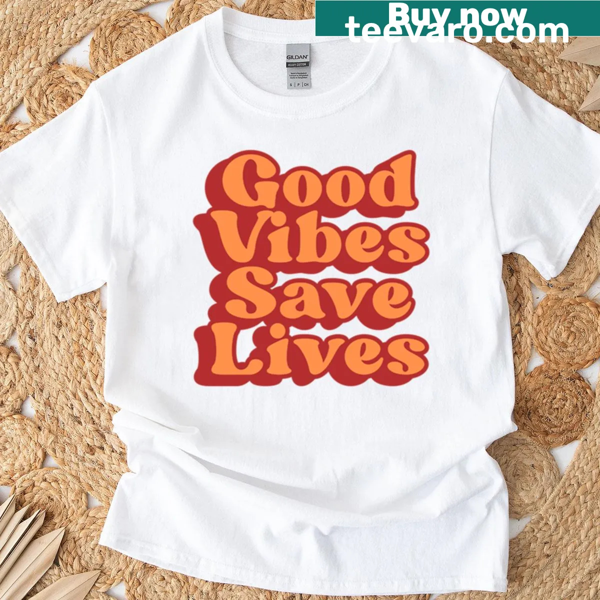 Typography design saying 'Good Vibes Save Lives' on a t-shirt — on a men's t-shirt