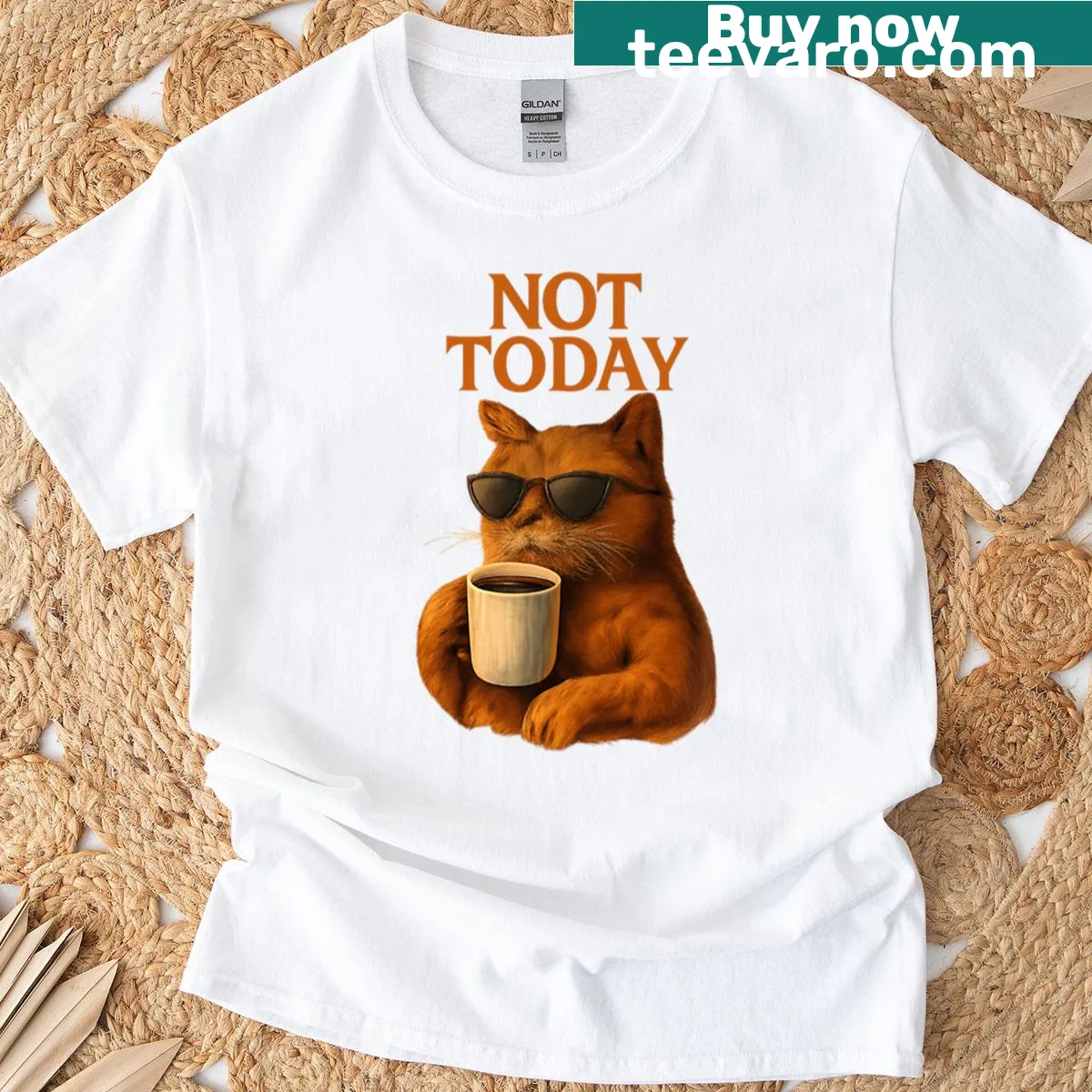 Cute cat t-shirt featuring a relaxed cat with a coffee cup — on a men's t-shirt