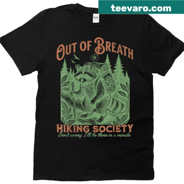 Humorous raccoon illustration on a hiking-themed T-shirt