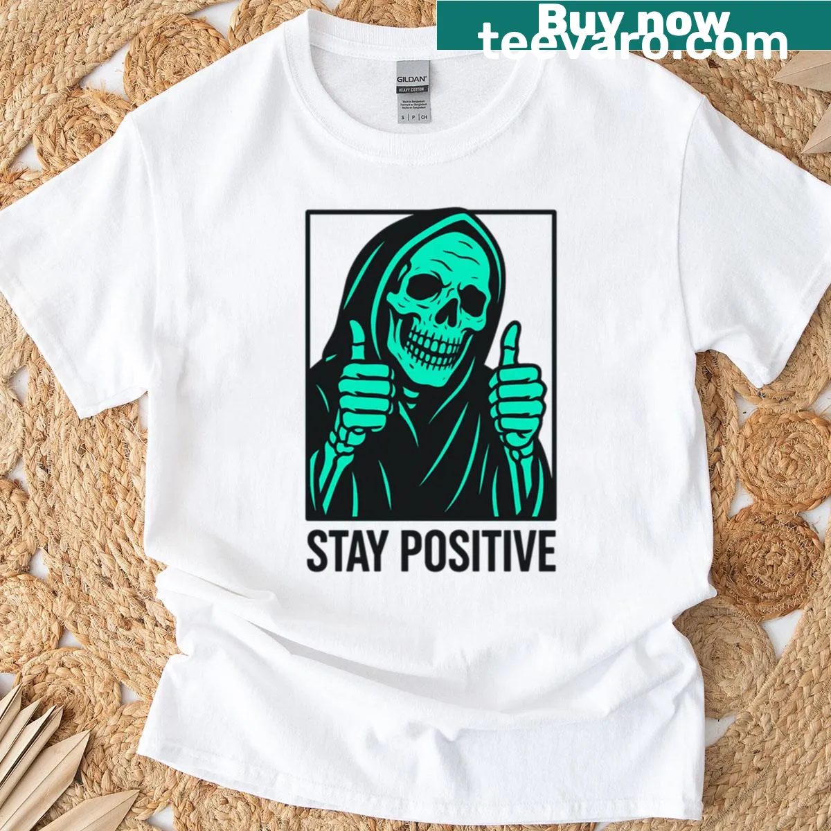 Whimsical reaper design with 'Stay Positive' text on a T-shirt — on a men's t-shirt