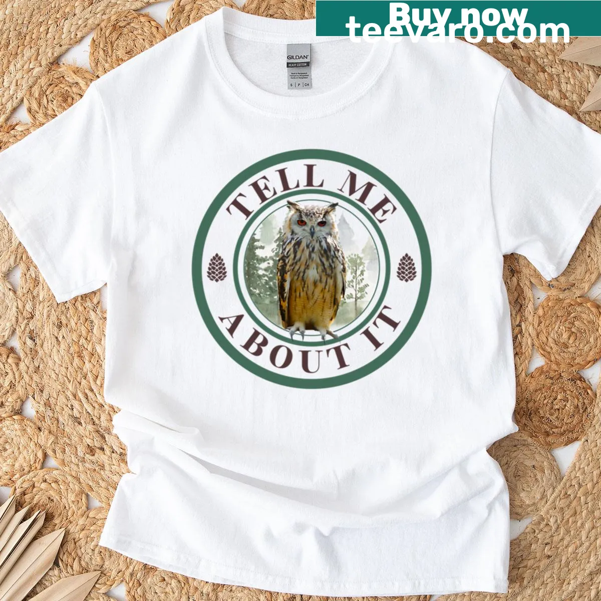 Playful T-shirt with an illustration of an owl and the phrase 'Tell Me Owl About It.' — on a men's t-shirt