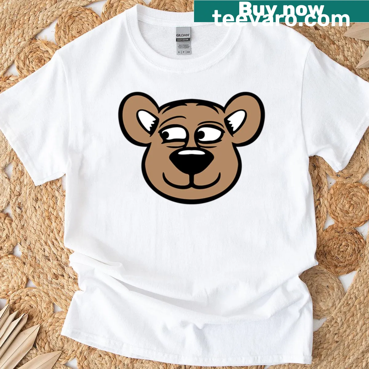 Cute teddy bear t-shirt with a happy, cheeky smile — on a men's t-shirt