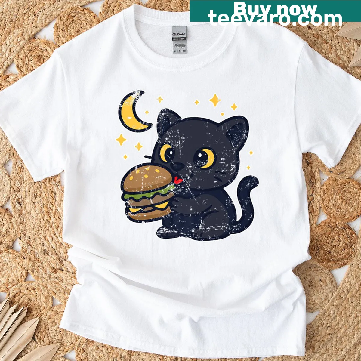 Cartoon black cat with a burger in a nighttime scene on t-shirt — on a men's t-shirt