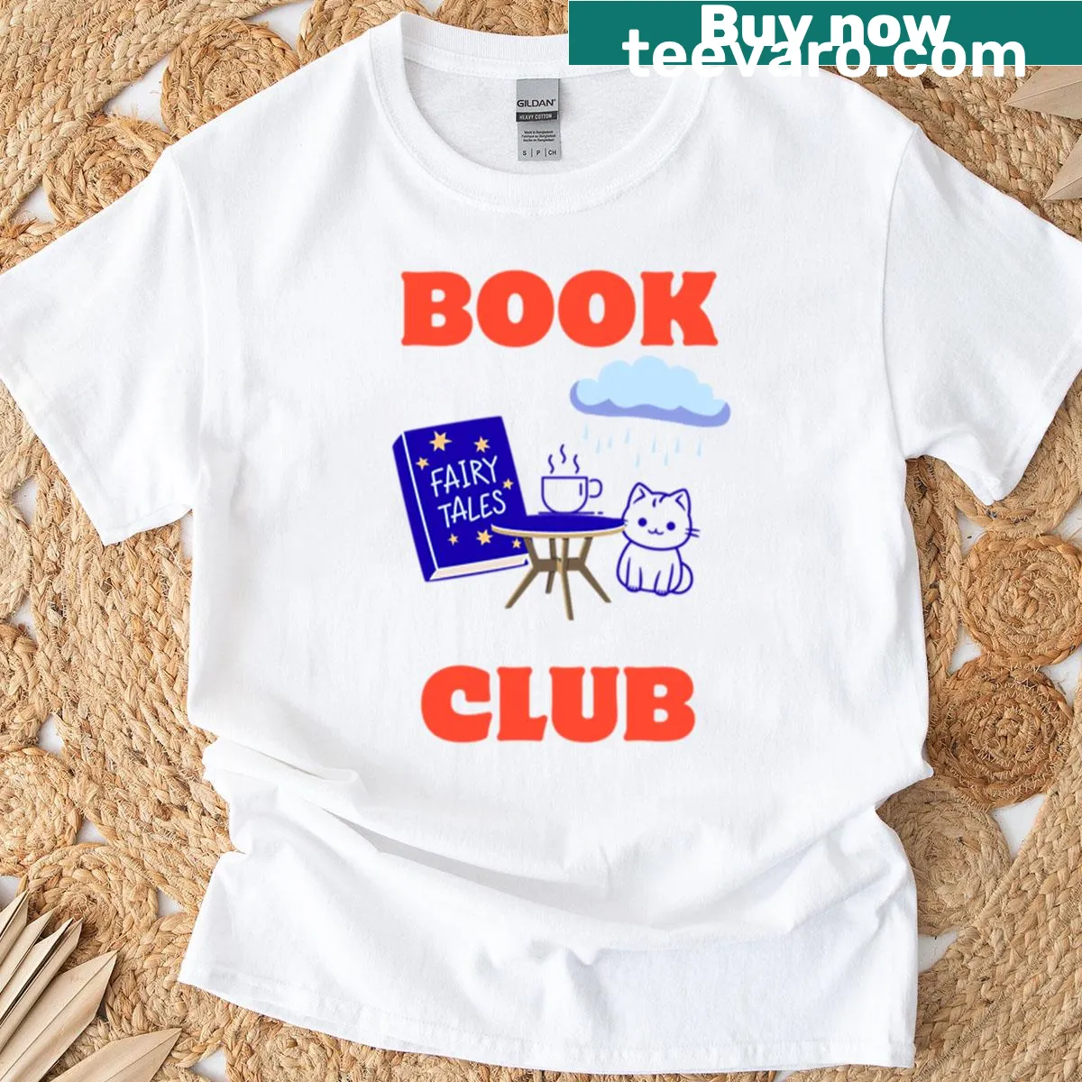 Cat, books, and coffee illustration on T-shirt — on a men's t-shirt