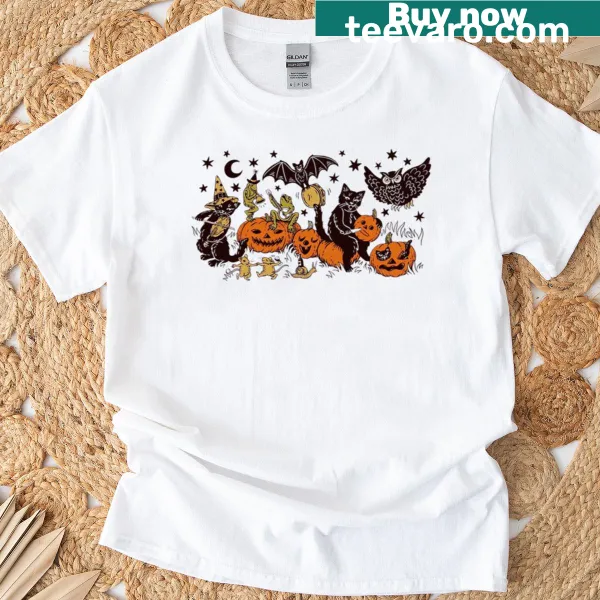 Vintage-style T-shirt featuring a frog and cat Halloween graphic.