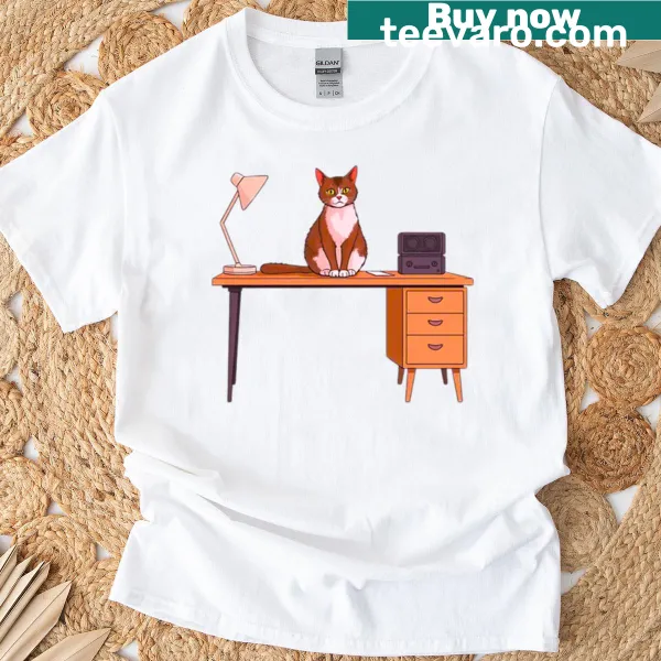 Cute kitten sitting on an office desk illustrated on T-shirt
