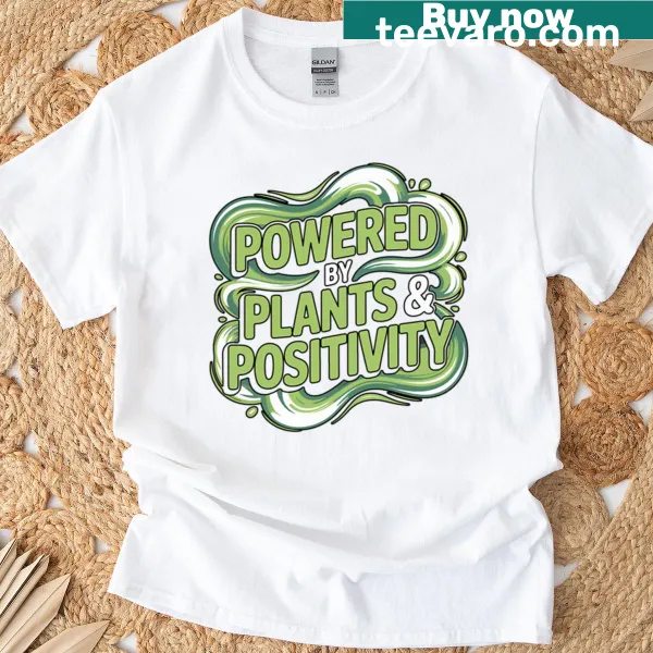 Motivational vegan quote T-shirt design with 'Powered By Plants'