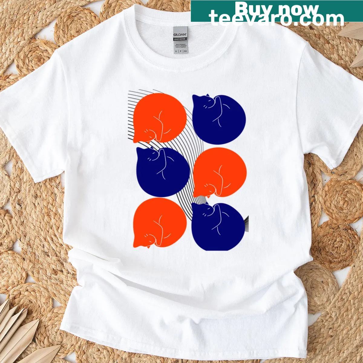 Abstract patterned t-shirt featuring round cats in a retro style. — on a men's t-shirt
